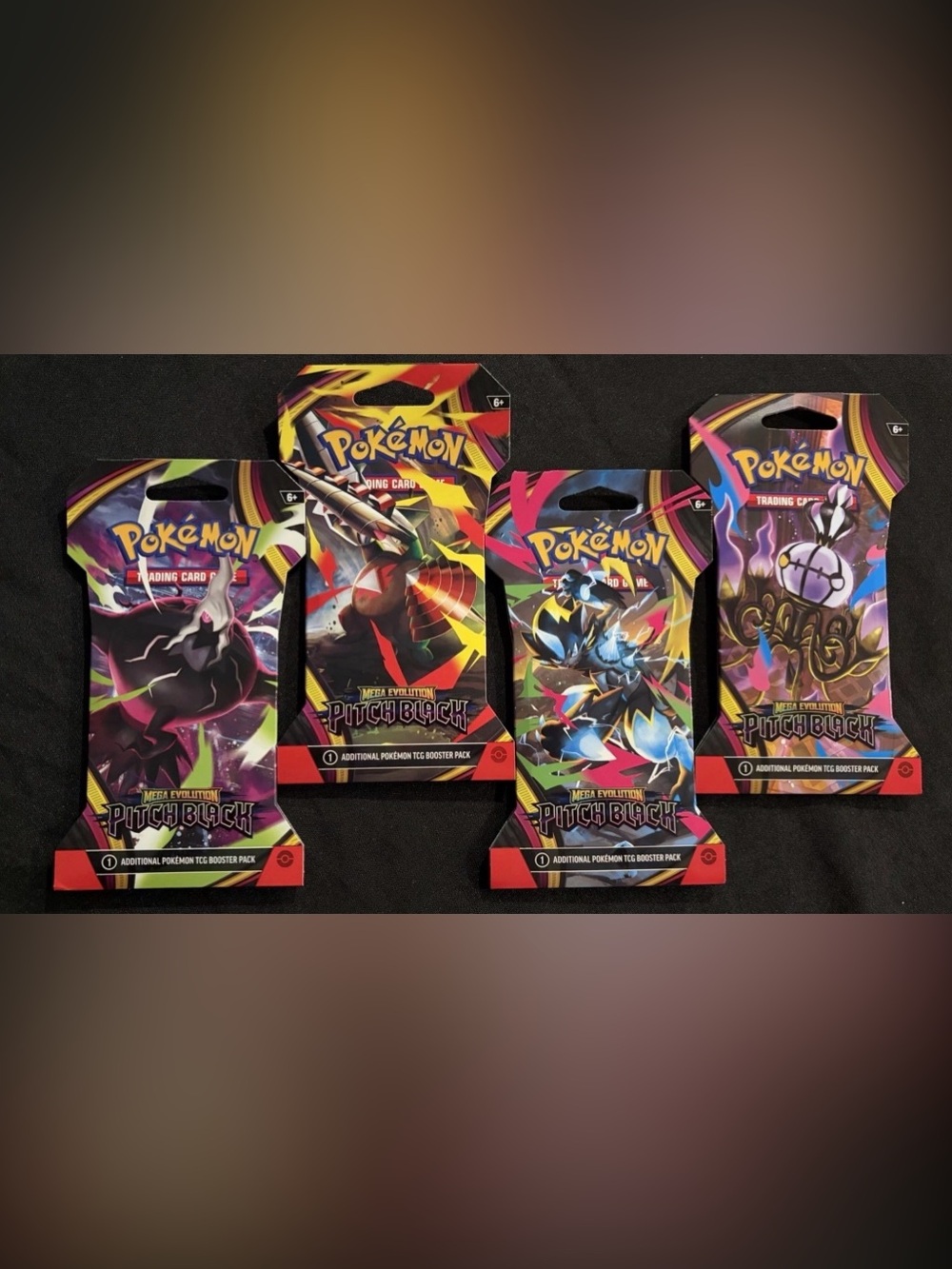 4 sealed packs of sold out Pokemon TCG Mega Evolution Pitch Black Booster Packs